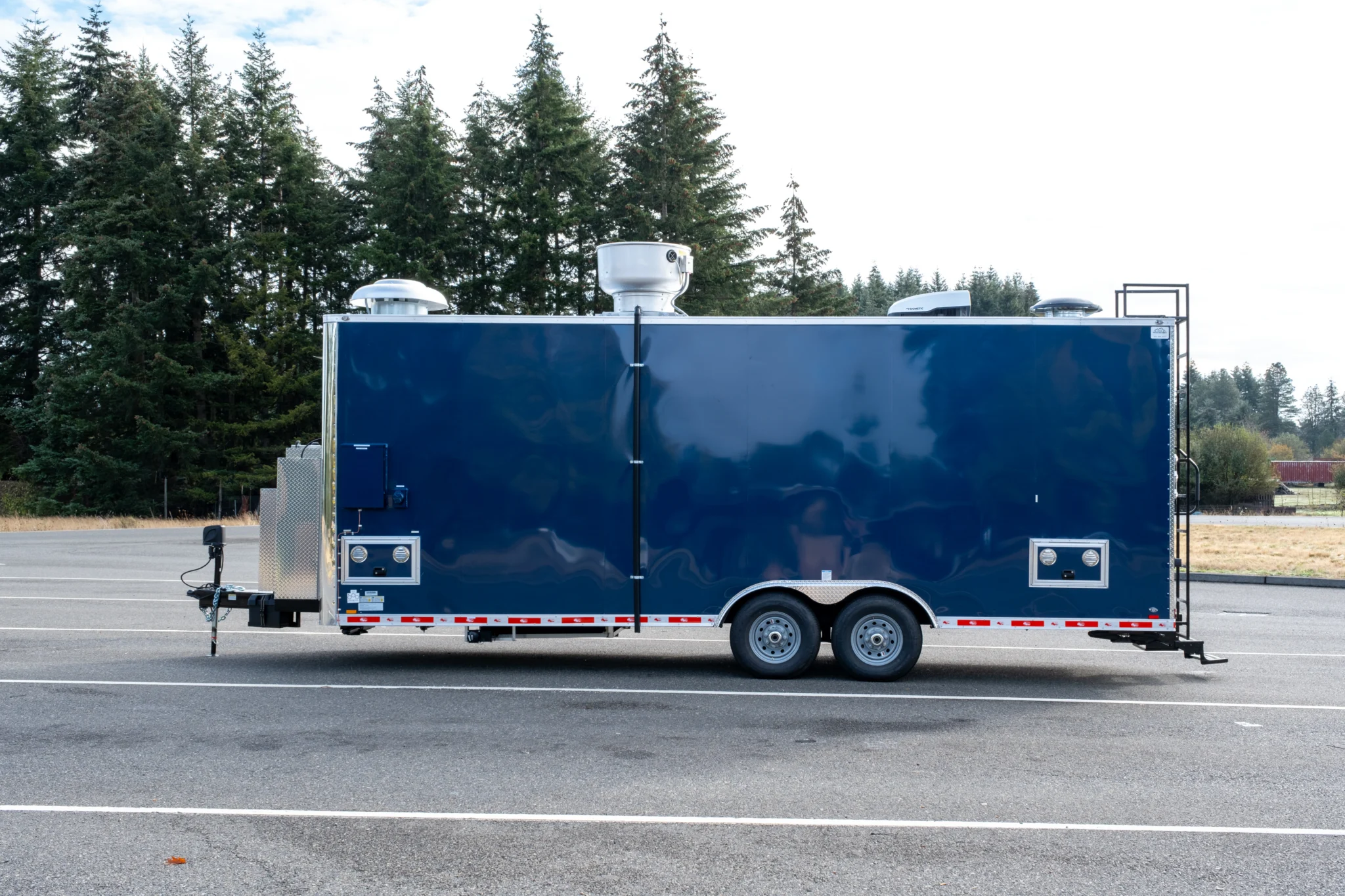 California custom food trailer featuring commercial refrigeration and food prep stations